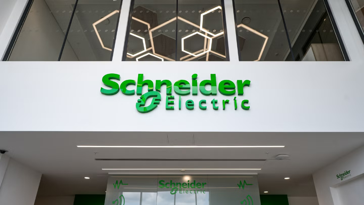 Schneider Electric logo displayed on the exterior of a modern office building.