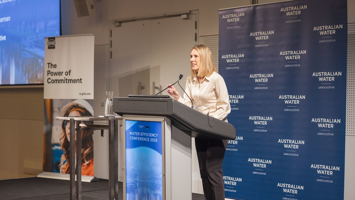 Speaker presenting on water efficiency at an Australian water industry conference