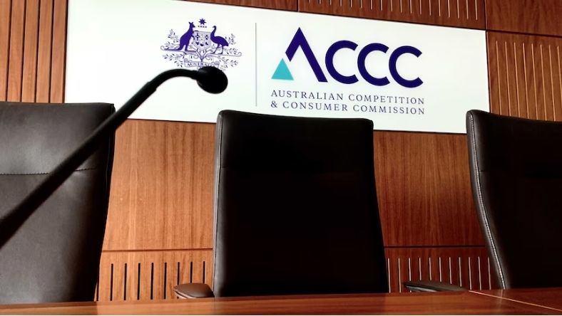 ACCC hearing room with commission logo